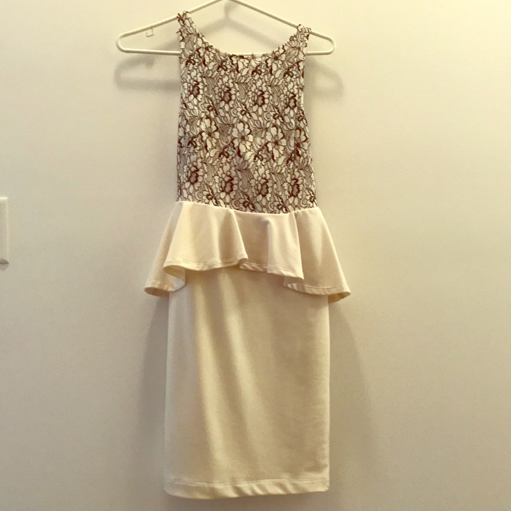 White peplum dress with black and white lace.